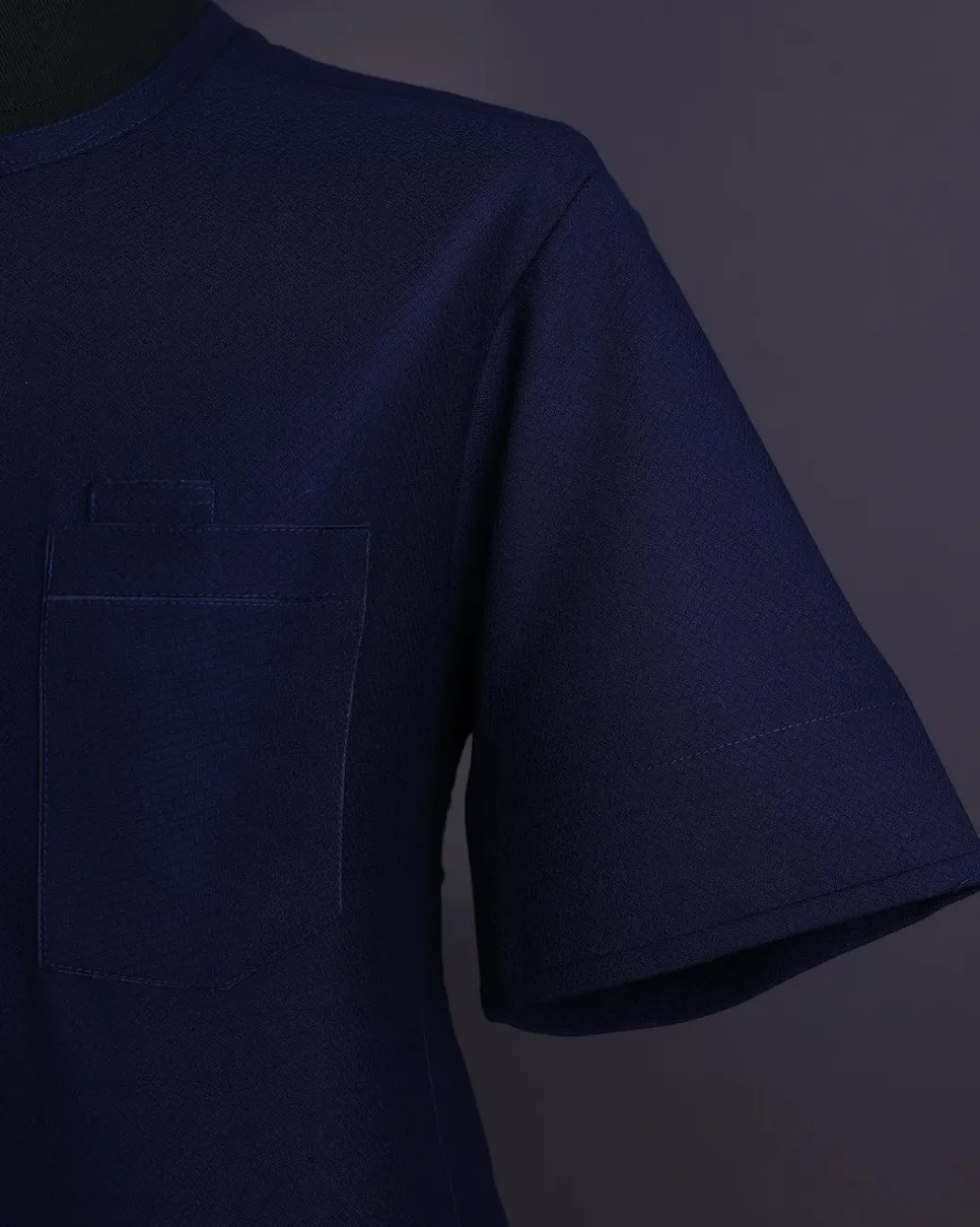 A Midnight blue, broken square pattern, Jorgecarli, front flap with black Swarovski button, 3/4 sleeve African senator Kaftan native.