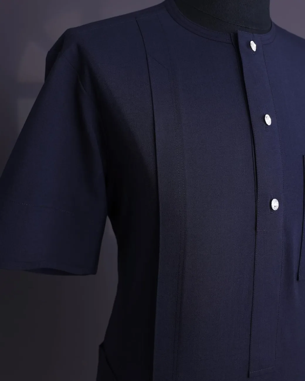 A Midnight blue, brown Aaron wool, front flap with silver Swarovski button, shorts sleeve African senator kaftan native.
