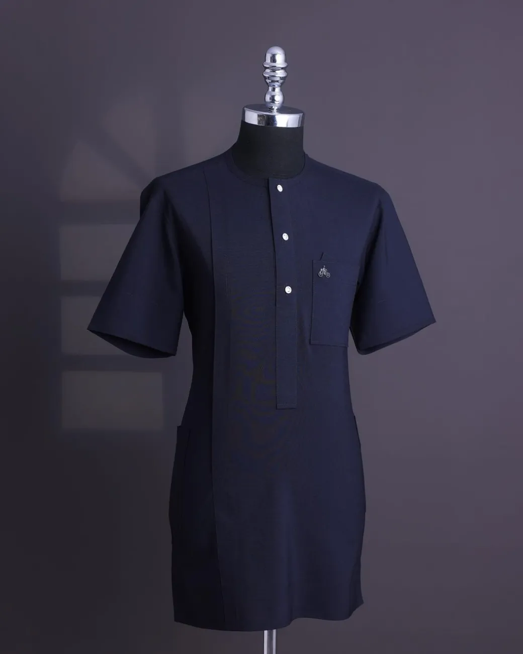 A Midnight blue, brown Aaron wool, front flap with silver Swarovski button, shorts sleeve African senator kaftan native.
