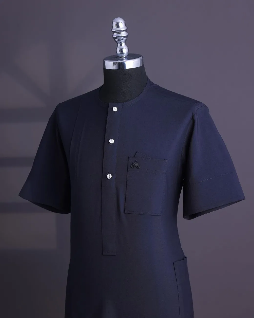 A Midnight blue, brown Aaron wool, front flap with silver Swarovski button, shorts sleeve African senator kaftan native.