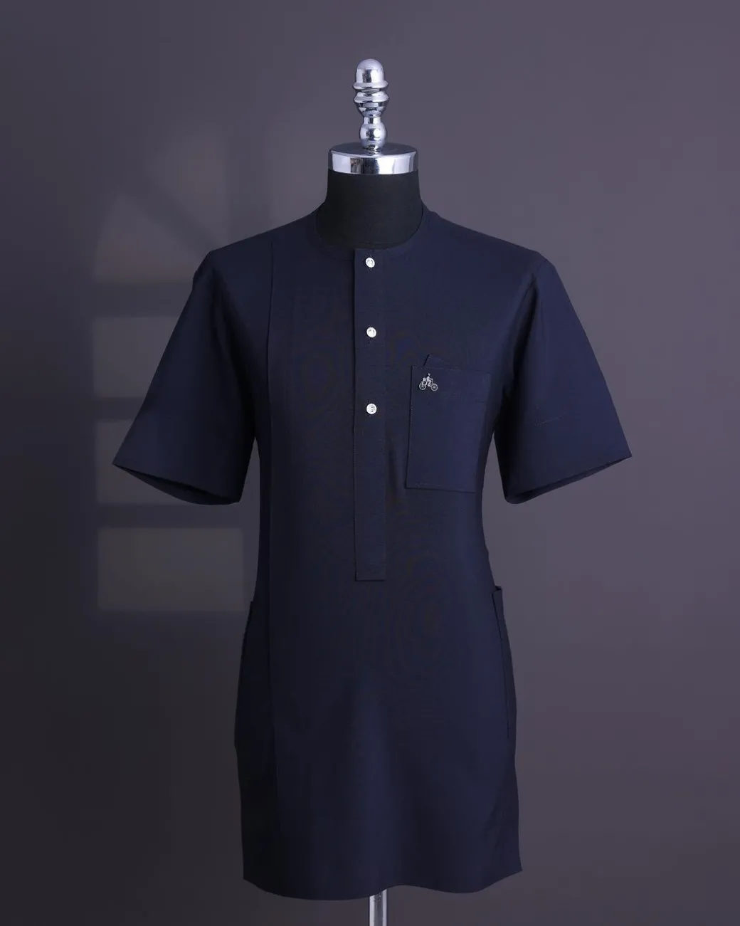 A Midnight blue, brown Aaron wool, front flap with silver Swarovski button, shorts sleeve African senator kaftan native.
