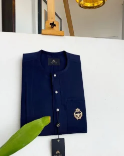 A Midnight Blue, clear view silver Swarovski buttons, gold bee adornment green pocket details African traditional senator kaftan native.