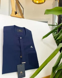 A midnight blue, clear view silver Swarovski buttons and ruffle pocket details African traditional senator kaftan native