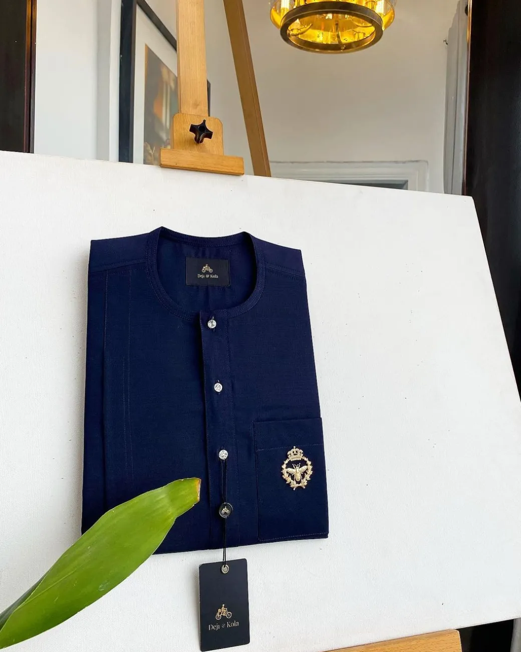 A Midnight Blue, clear view silver Swarovski buttons, gold bee adornment green pocket details African traditional senator kaftan native.