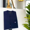 A midnight blue, front flap, combat design pocket African traditional senator kaftan native.