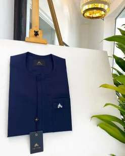 A midnight blue, front flap, combat design pocket African traditional senator kaftan native.