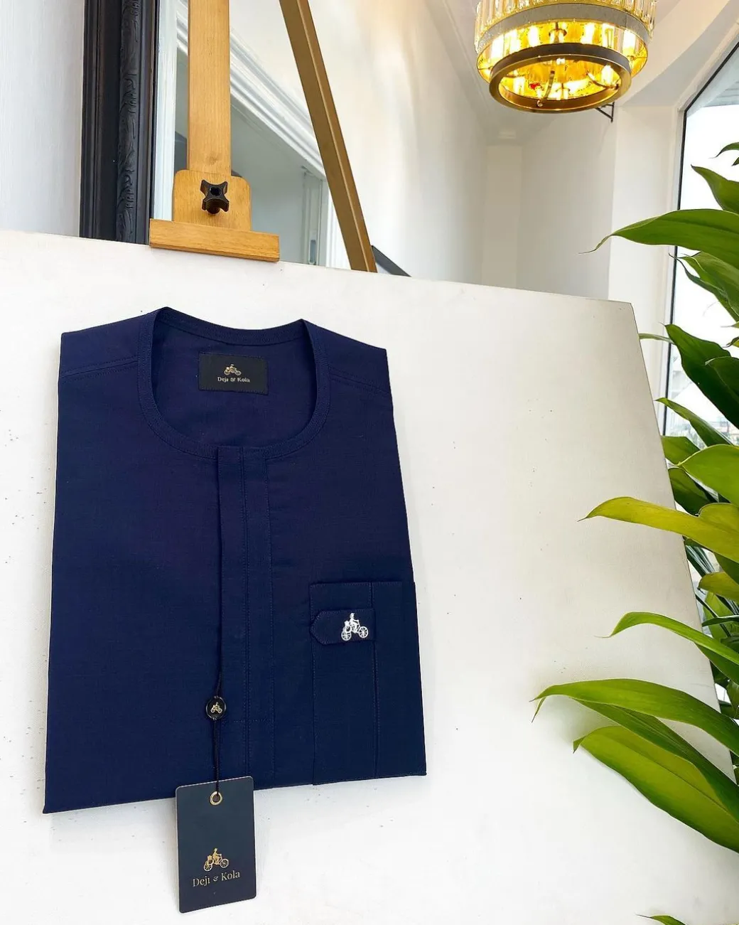 A midnight blue, front flap, combat design pocket African traditional senator kaftan native.