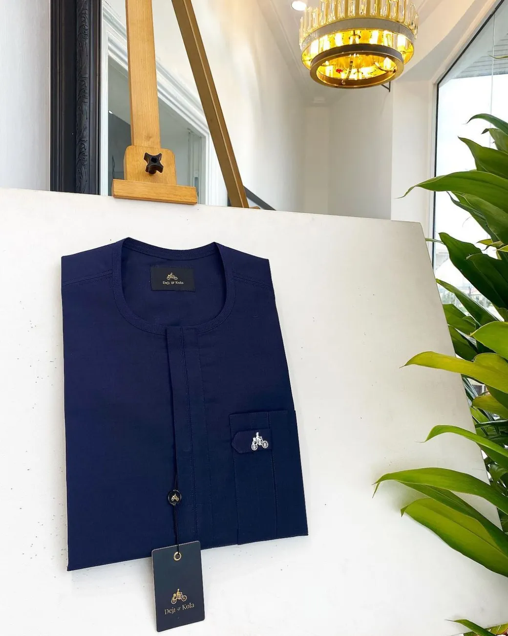 A midnight blue, front flap, combat design pocket African traditional senator kaftan native.
