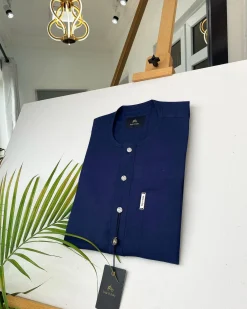 A Midnight Blue Kaftan with ABV diamond shape Australian Swarovski button