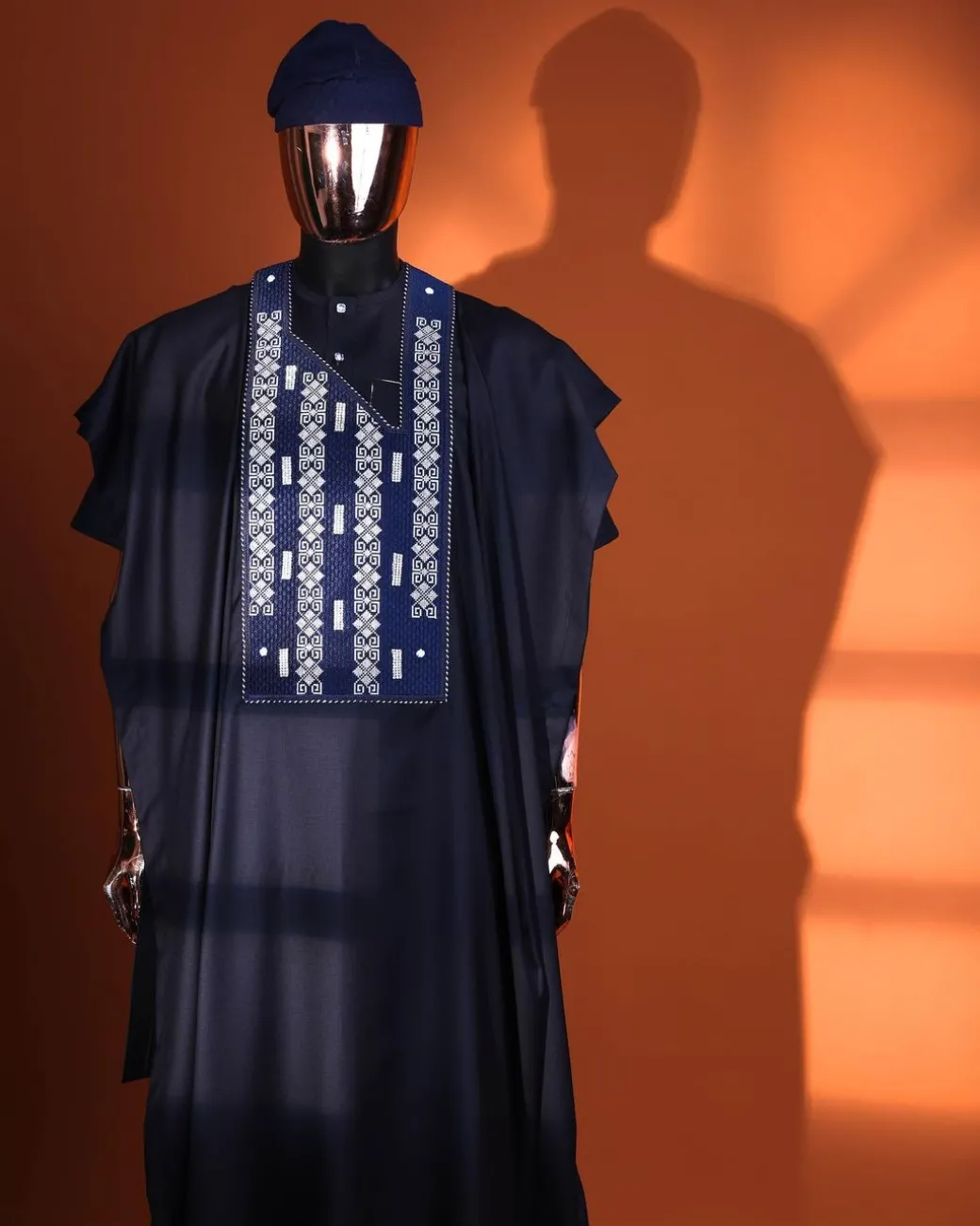 A Midnight blue, shattered interwoven embroidery with Swarovski stones details Agbada