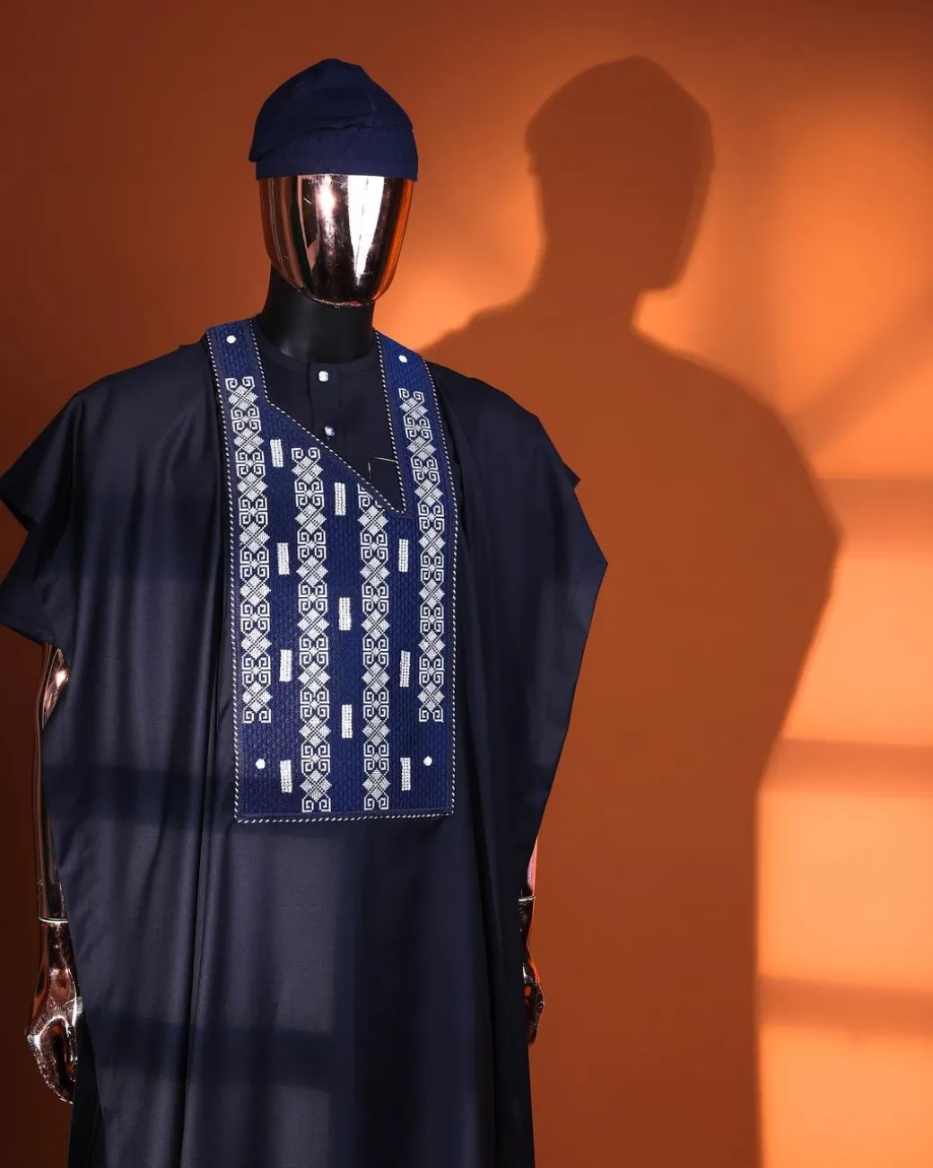 A Midnight blue, shattered interwoven embroidery with Swarovski stones details Agbada