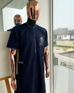 A Midnight blue, Skye blue, and black cloud pattern metallic Jacquard flap and pocket detailing African traditional senator kaftan native