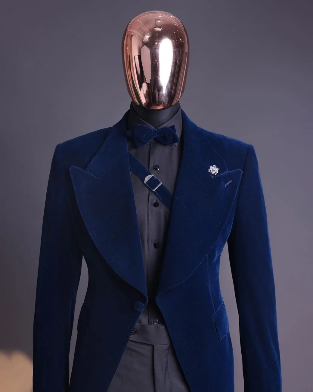 A Midnight Blue, Soaked Velvet Fabric, Knitted, Wide Peak Lapel Tuxedo Suit.