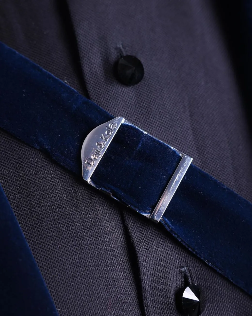 A Midnight Blue, Soaked Velvet Fabric, Knitted, Wide Peak Lapel Tuxedo Suit.