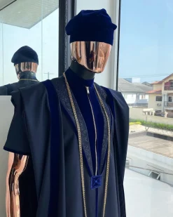 A Midnight blue, vehicular lapelled with zip line flap & navy blue soaked Italian velvet mix embroidery design details agbada