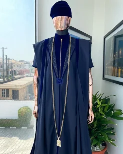 A Midnight blue, vehicular lapelled with zip line flap & navy blue soaked Italian velvet mix embroidery design details agbada