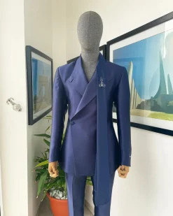 A Mikado Silk “rumble in jungle”, wrap Notch lapel, slant sache blazer suit.