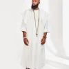 A Milk White embroidery detailing African Agbada