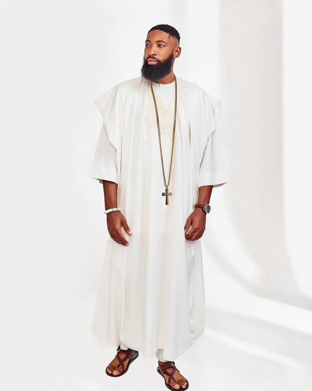 A Milk White embroidery detailing African Agbada