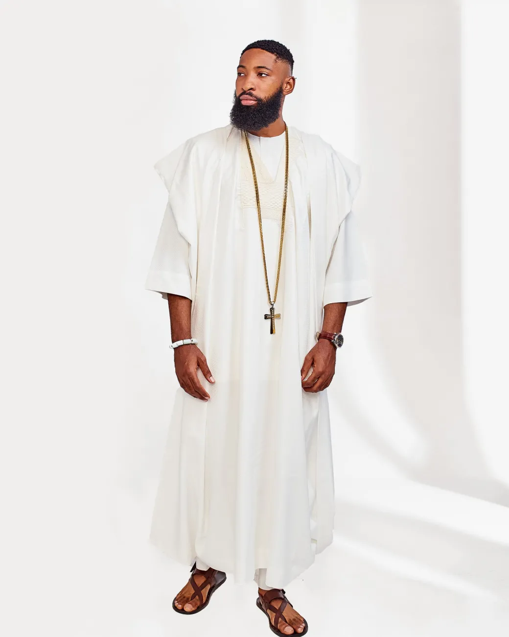 A Milk White embroidery detailing African Agbada