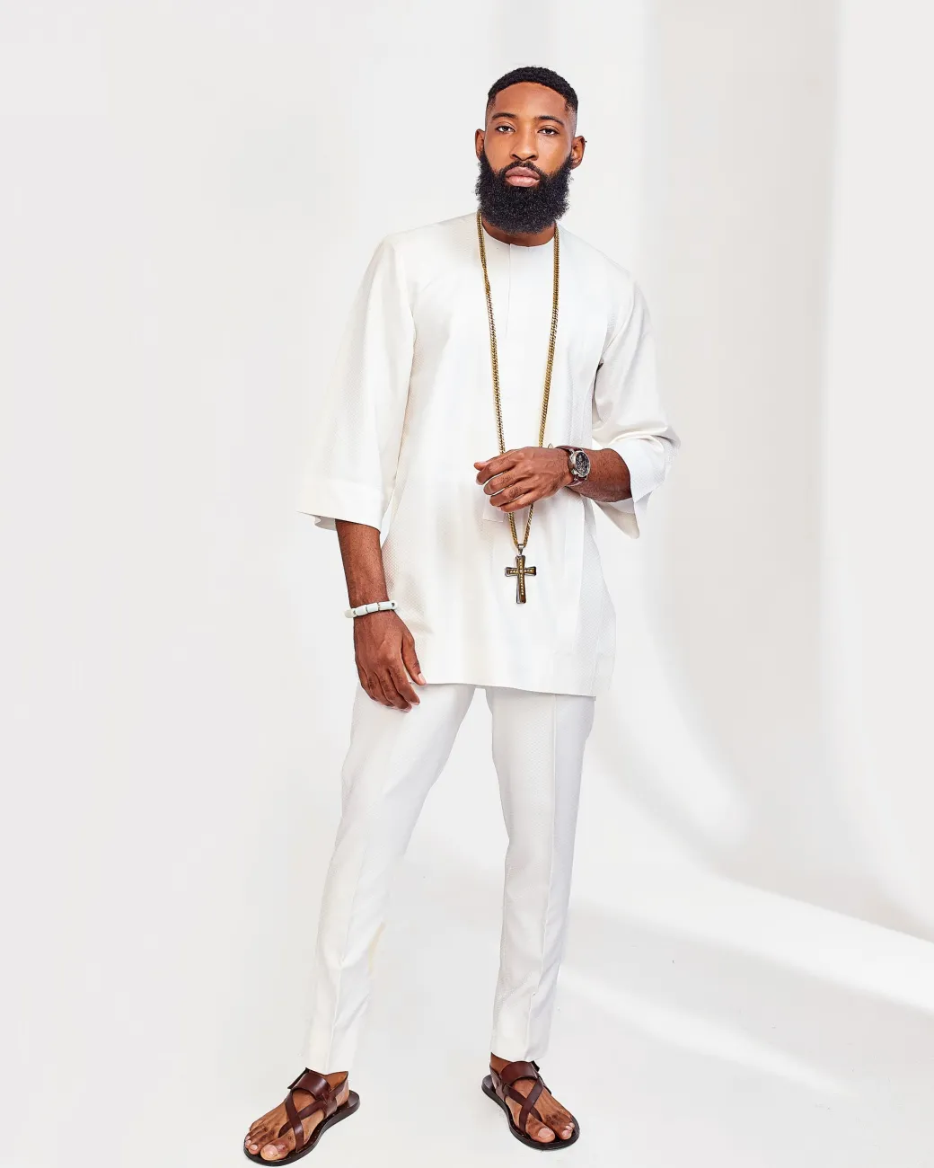 A Milk White embroidery detailing African Agbada