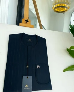 A Mix of Blue & Grey Stripe, V shaped patch pocket details African traditional senator kaftan native.