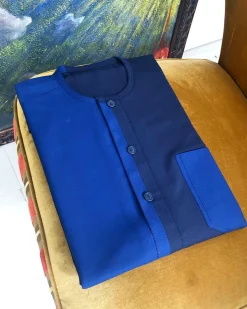 A Mixed navy and sky blue button flap African kaftan