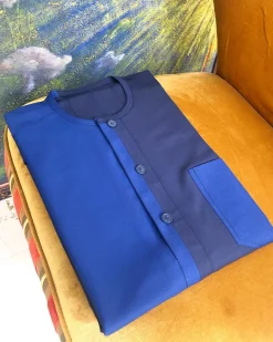 A Mixed navy and sky blue button flap African kaftan