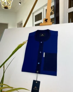 A Mixed shade of blue with a clear view of Swarovski buttons African kaftan and Sokoto