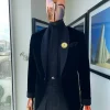 A monochrome charcoal black shawl lapel soaked Italian velvet tuxedo suit