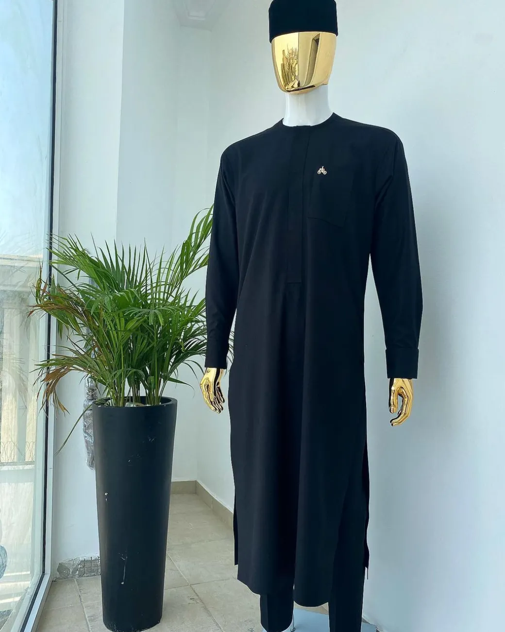 A monochrome Charcoal Black long senator kaftan