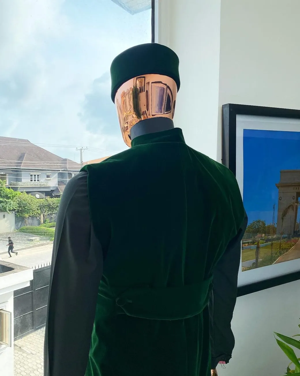 A monochrome forest green long senator kaftan, Soaked premium velvet kimono with Black Swarovski button details & matching velvet round cap.