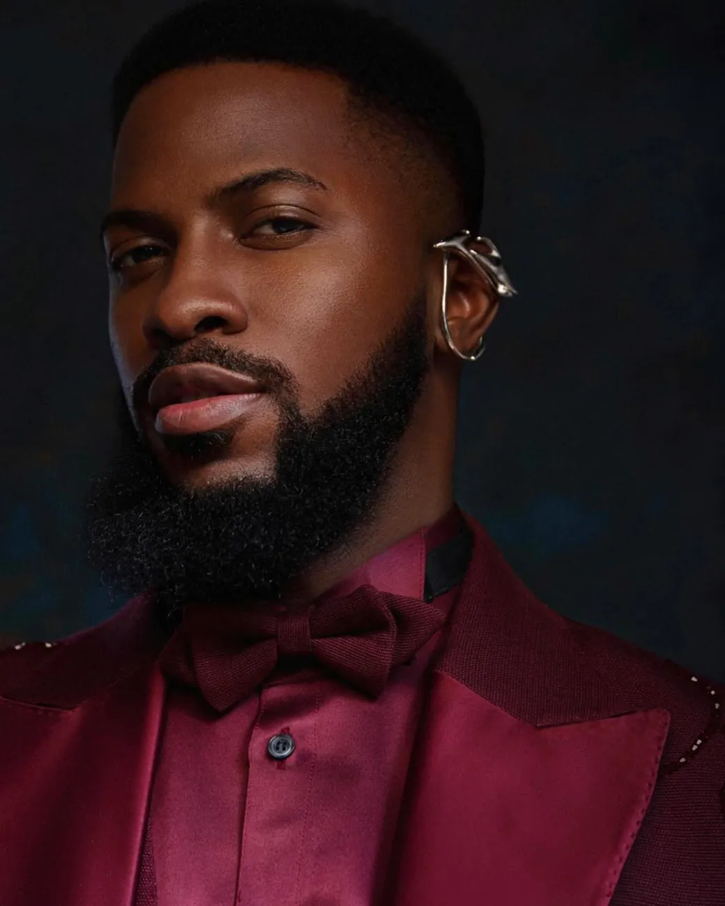 A monochrome, knitted, hand-woven aso-oke, matching bead layering tuxedo suit
