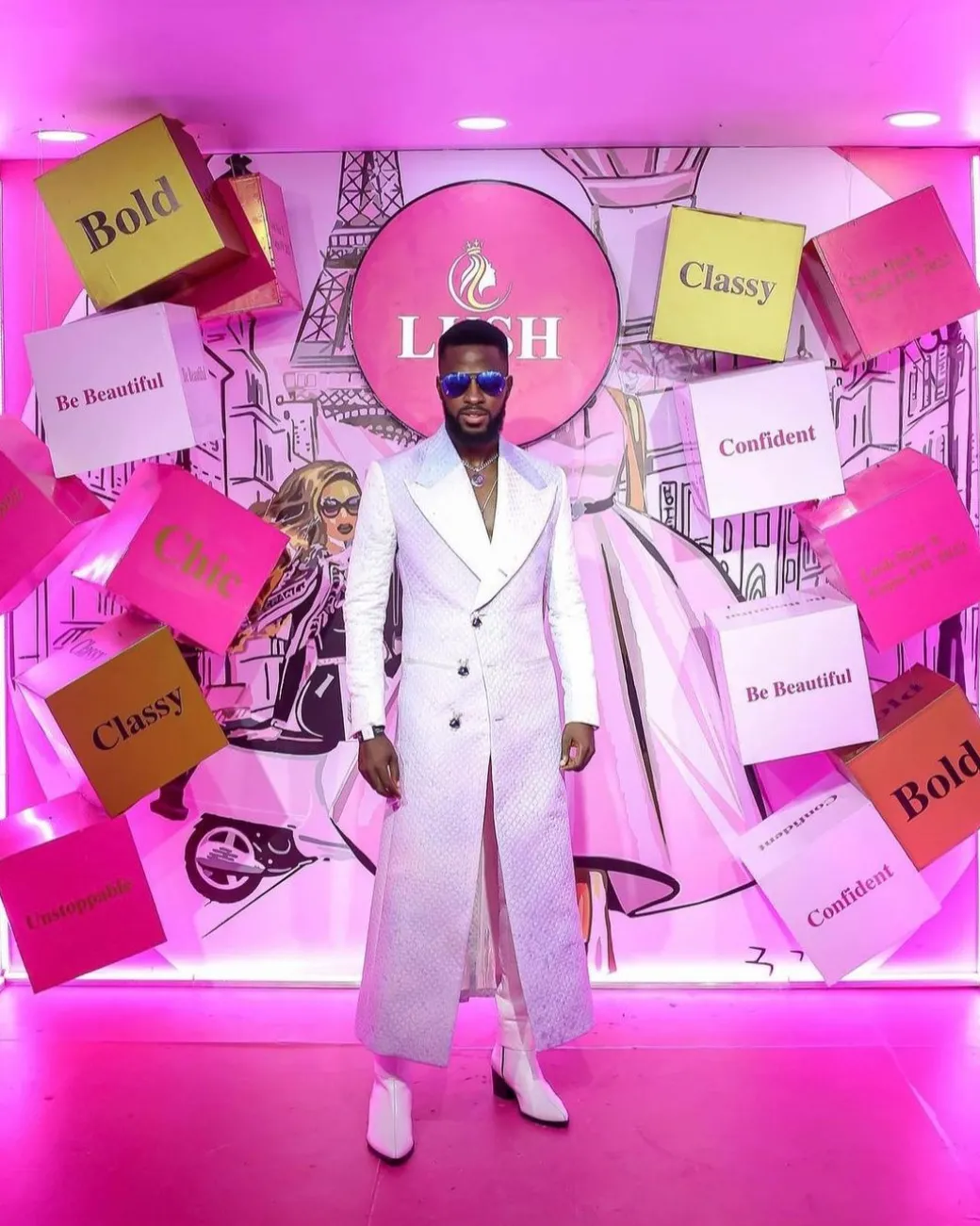 A monochrome, peak lapel, light multi-color dyed trench double breasted jacquard with bunny button details suit