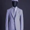 A monochrome seersucker (rail road stripe) notch lapel suit