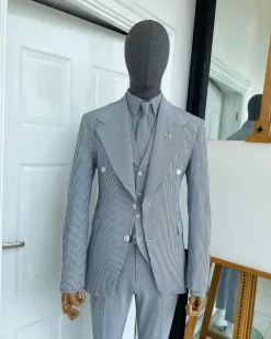 A monochrome seersucker (rail road stripe) notch lapel suit