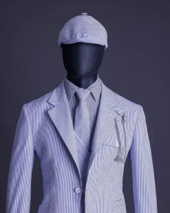 A monochrome seersucker (rail road stripe) notch lapel suit