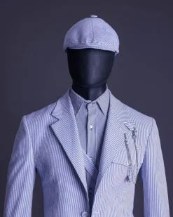 A monochrome seersucker (rail road stripe) notch lapel suit