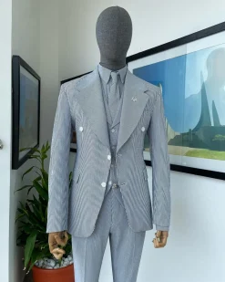 A monochrome seersucker (rail road stripe) notch lapel suit