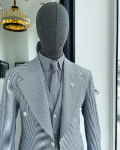 A monochrome seersucker (rail road stripe) notch lapel suit