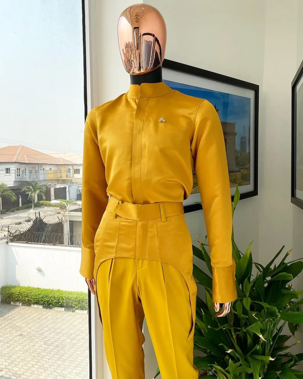 A monochrome Yellow “Made in Lagos” bishop neck shirt