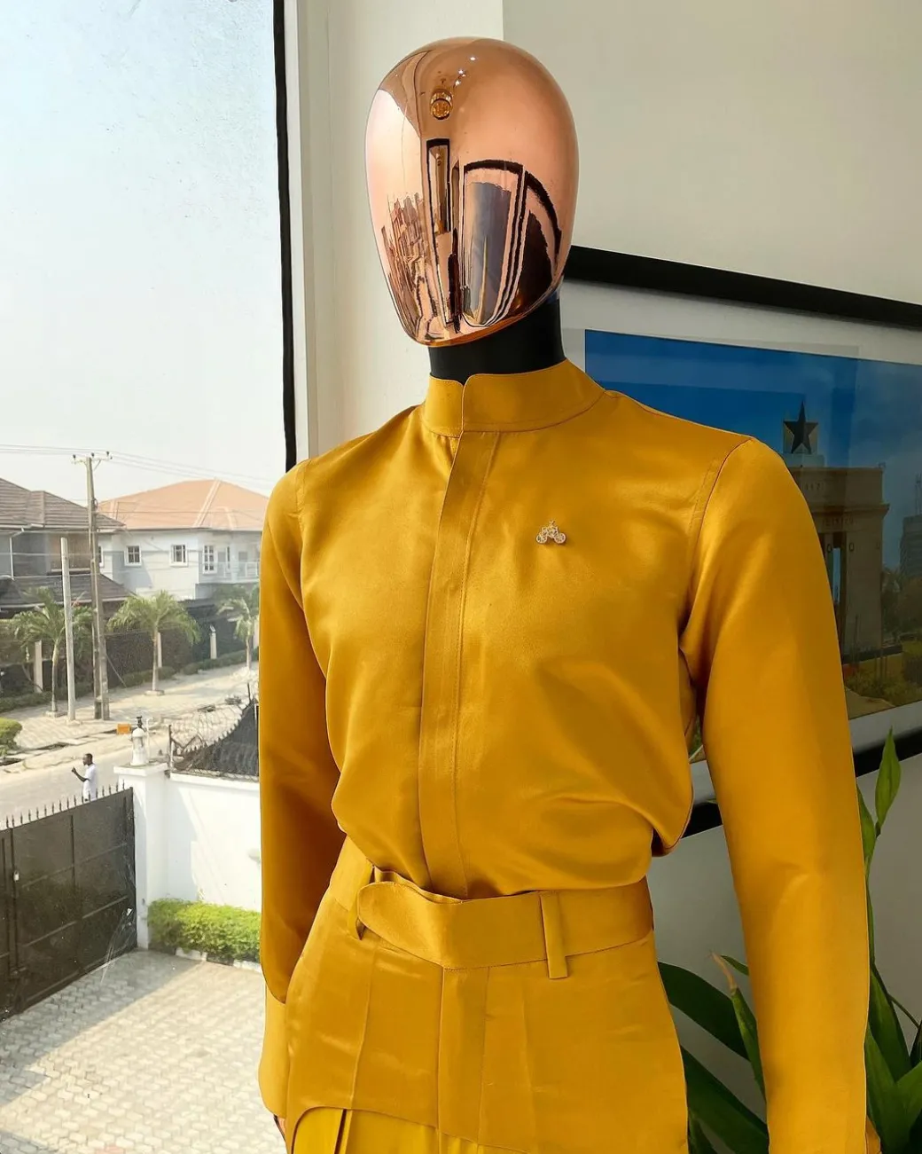 A monochrome Yellow “Made in Lagos” bishop neck shirt