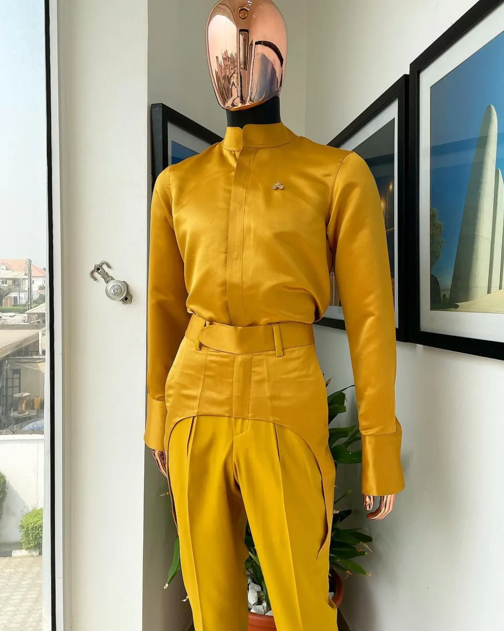 A monochrome Yellow “Made in Lagos” bishop neck shirt