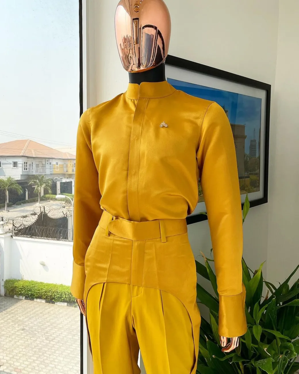 A monochrome Yellow “Made in Lagos” bishop neck shirt