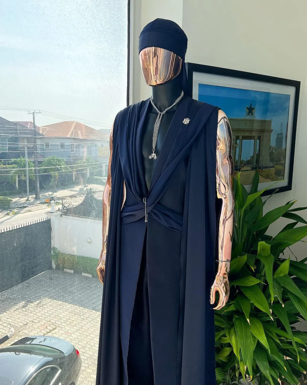 A “Mr Money” navy blue, deconstructed veil on trench silk peak lapel jacket