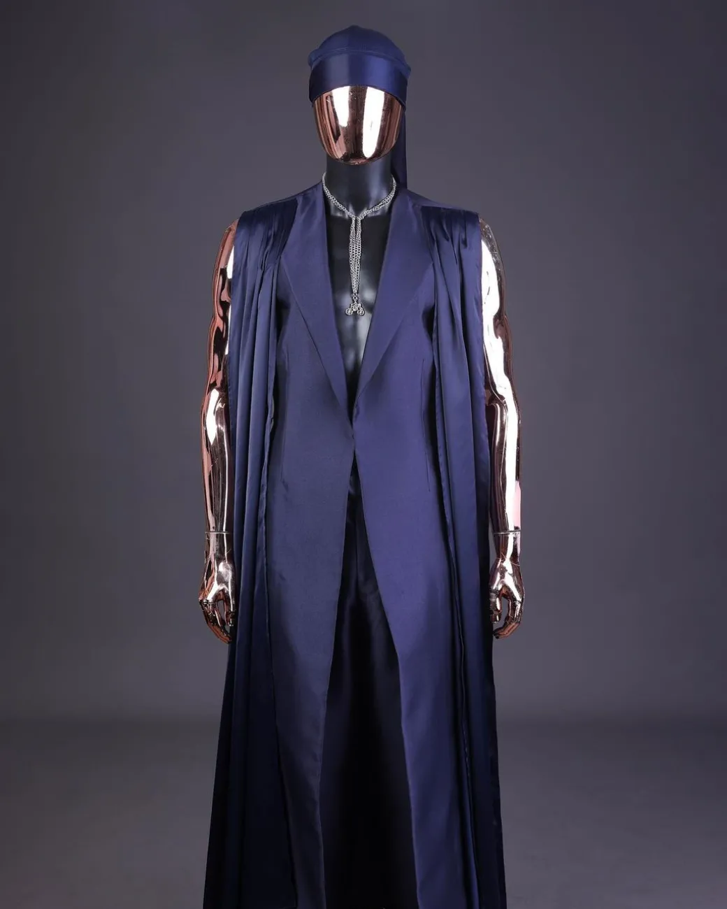 A “Mr Money” navy blue, deconstructed veil on trench silk peak lapel jacket