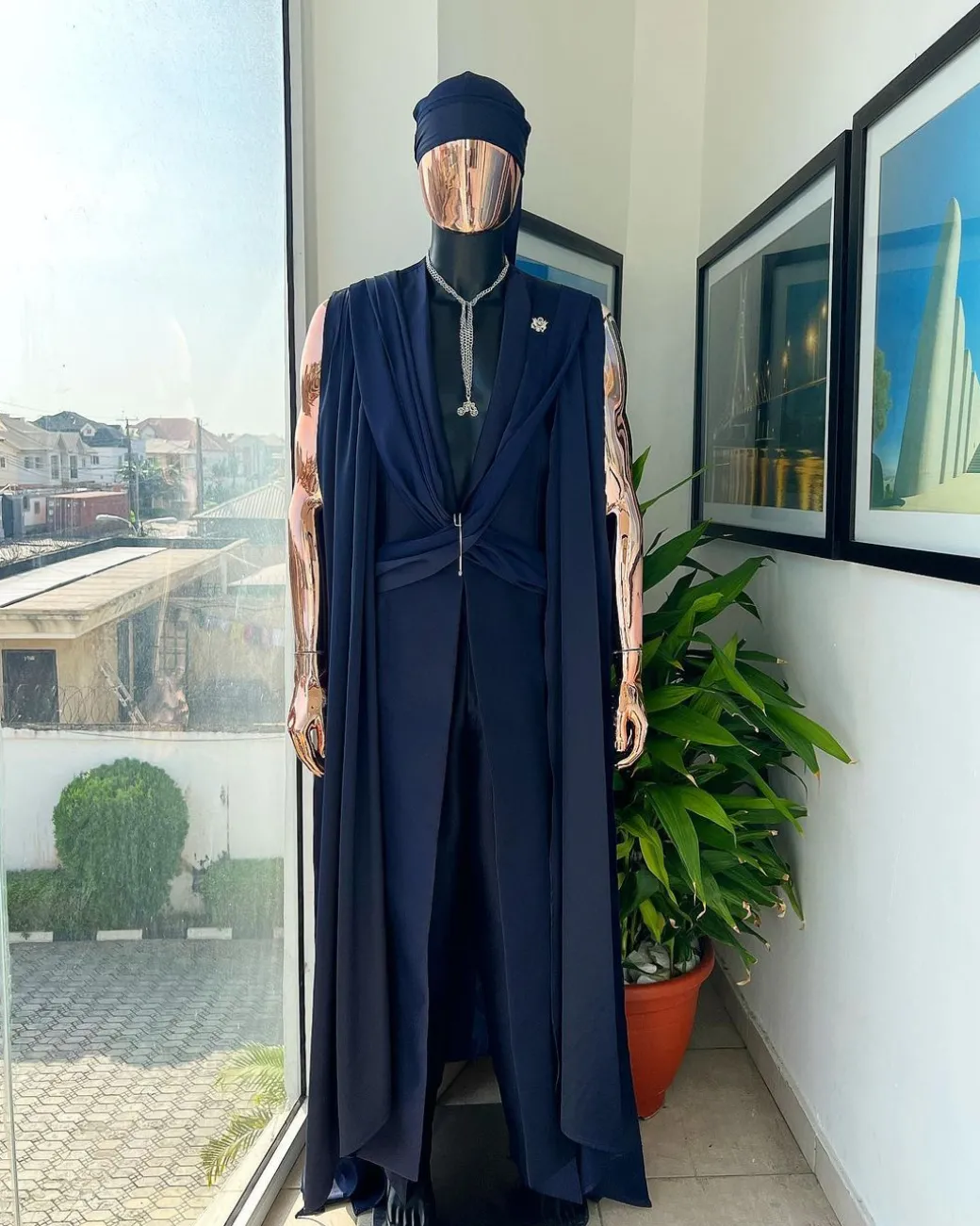 A “Mr Money” navy blue, deconstructed veil on trench silk peak lapel jacket