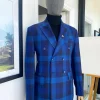 A multicolor shade of blue windowpane check double breasted Peak lapel suit