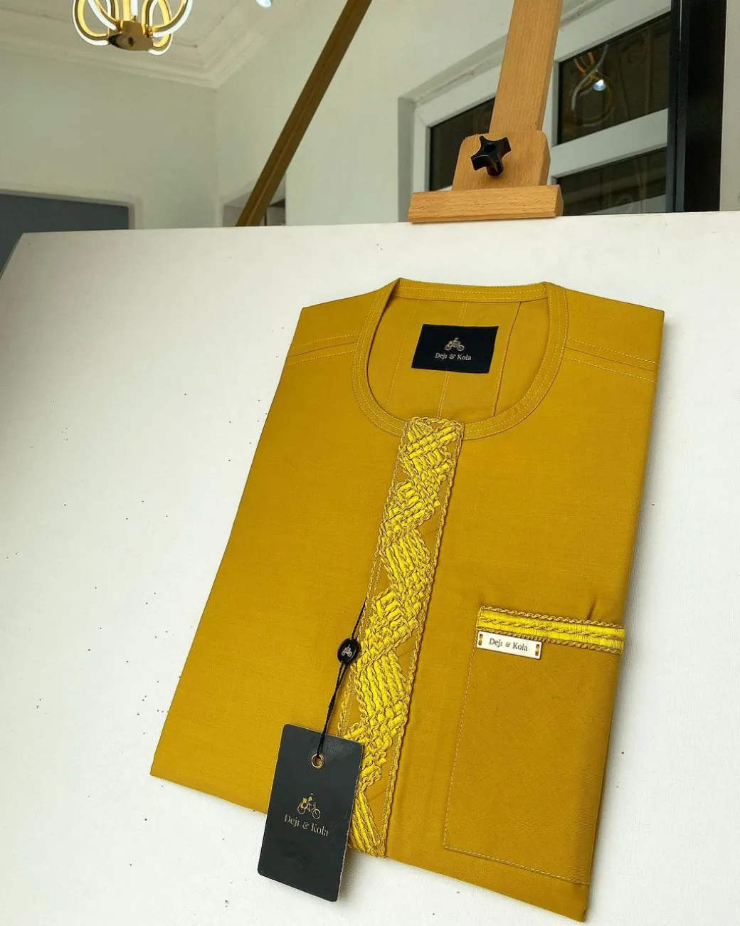 A Mustard Yellow Embroidery African kaftan with an interlocking lane design and sokoto