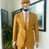 A Mustard Yellow Linen Jacket, Slim Cut Tie, Gurkha Pant Trousers, And Hat